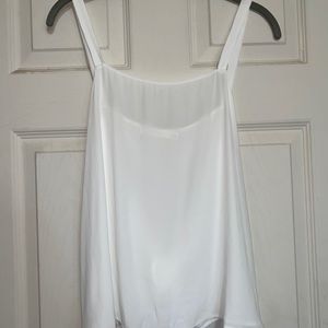 Super cute blouse tank top! Only worn twice!